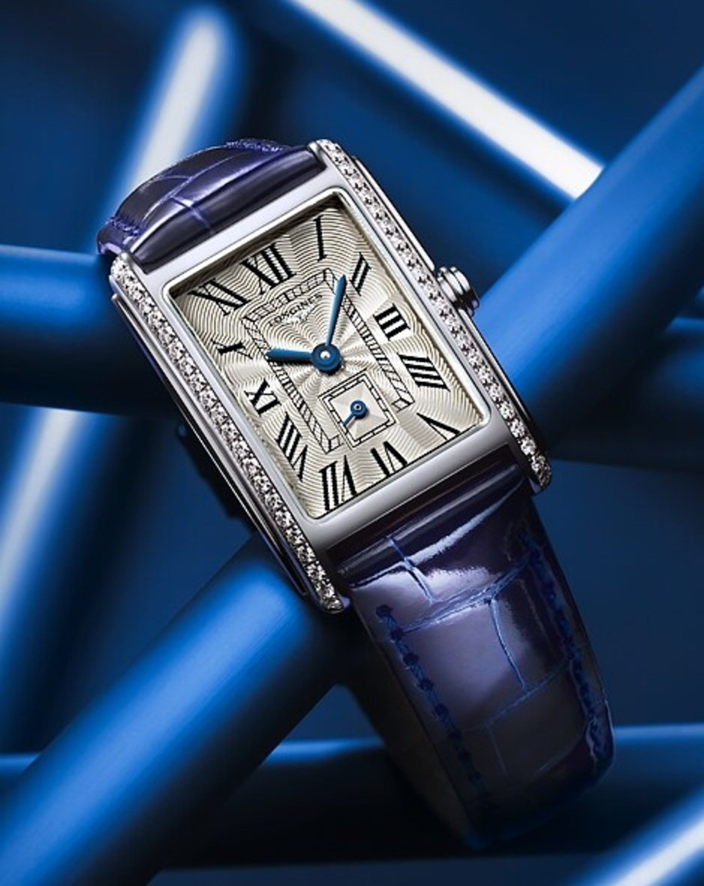 a Longines Dolcevita watch with diamonds and blue strap
