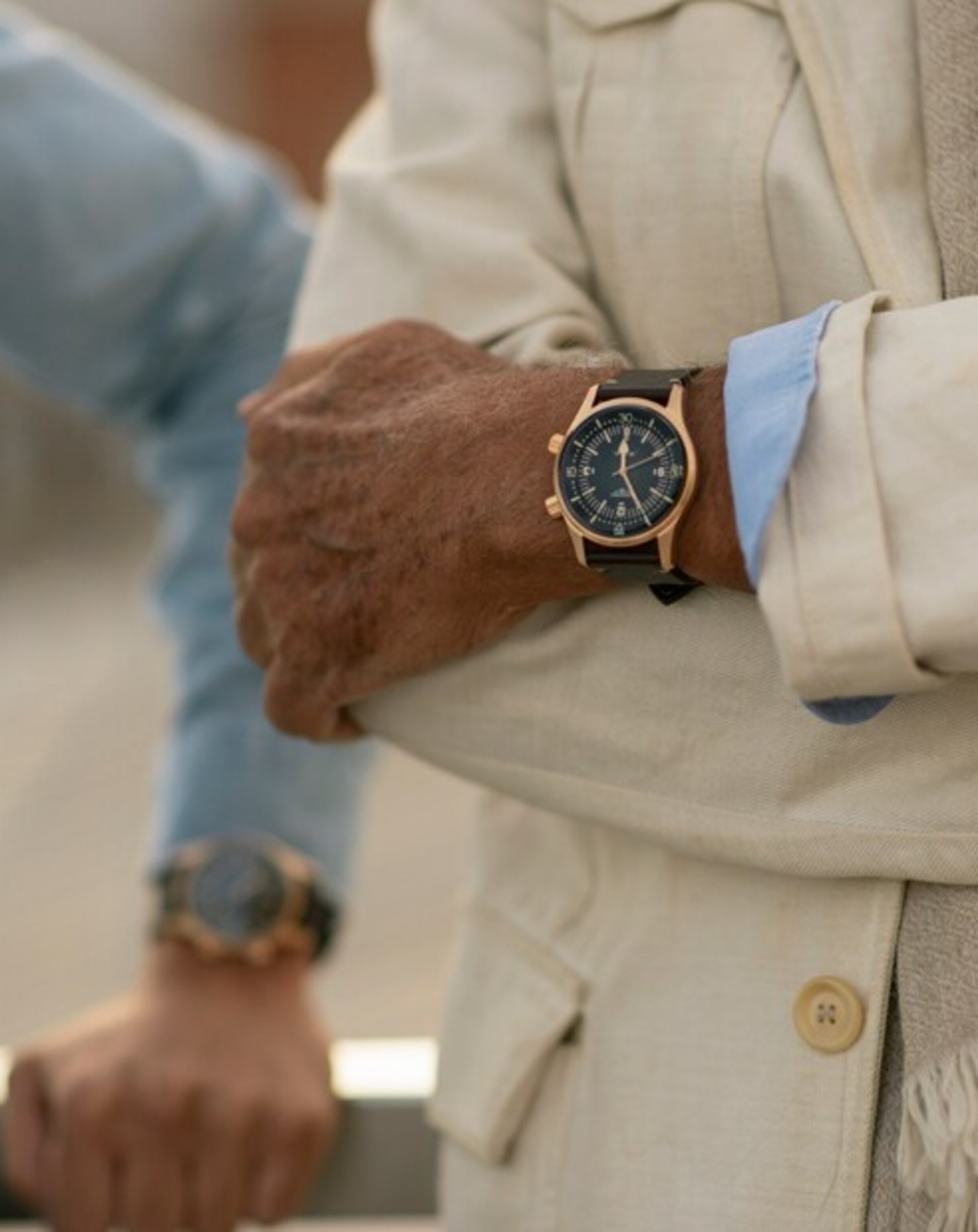 a Longines watch on a male wrist