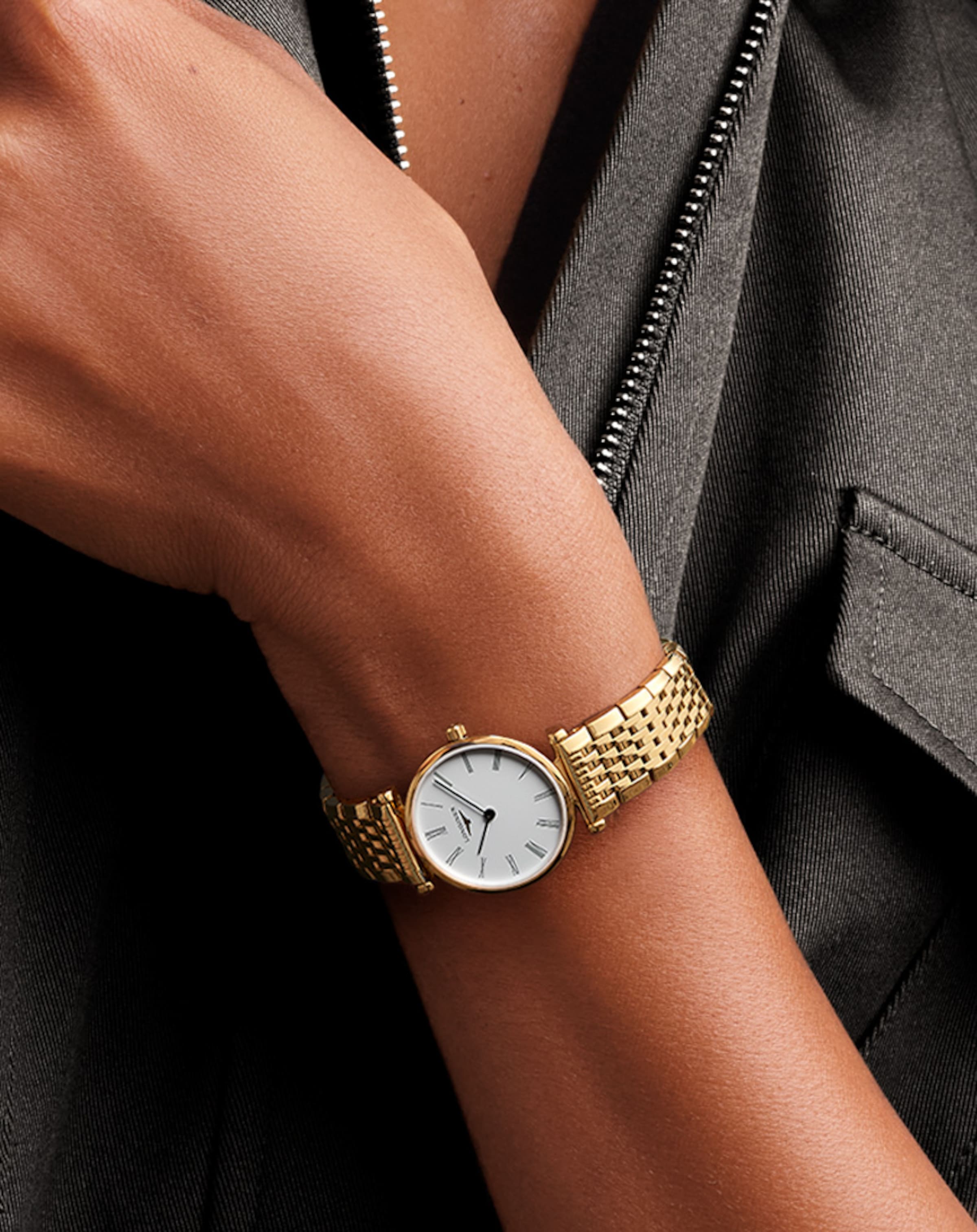 a Longines quartz watch on a female wrist