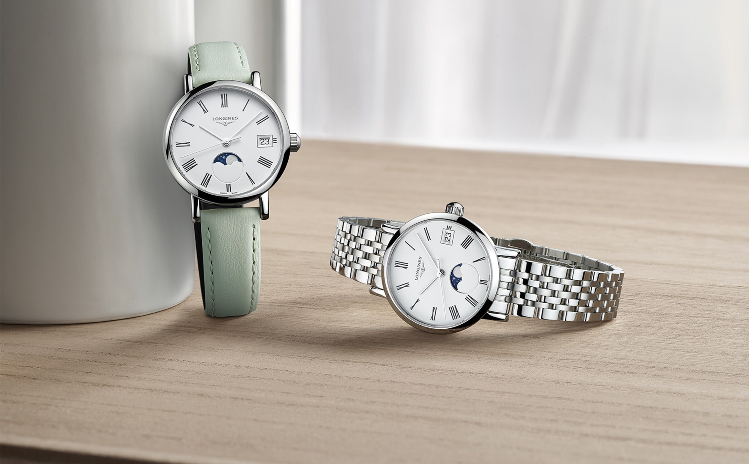 The Longines Elegant Collection duo white dial and steel bracelet and green strap 1600X992