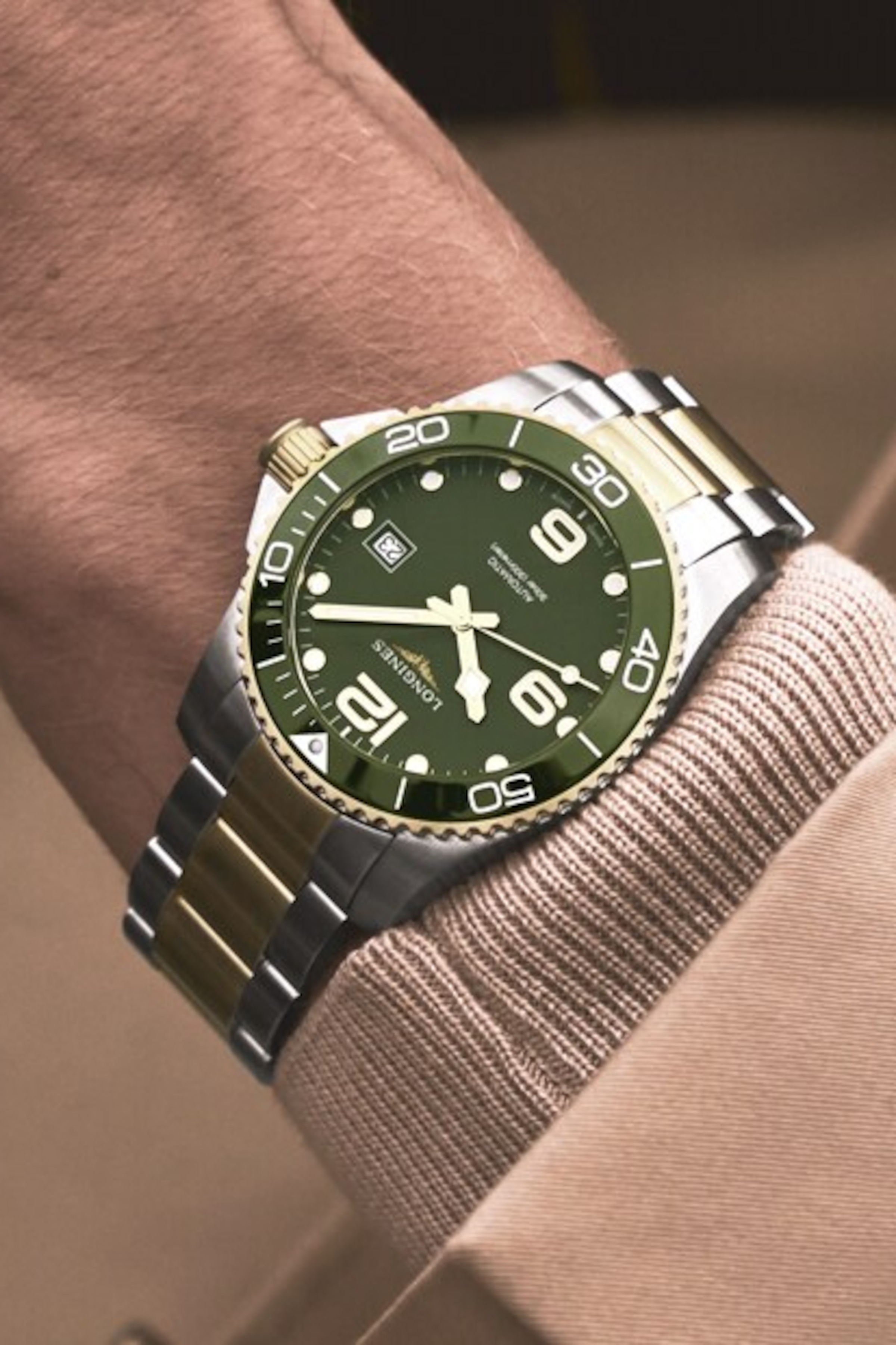a Longines Hydroconquest green watch